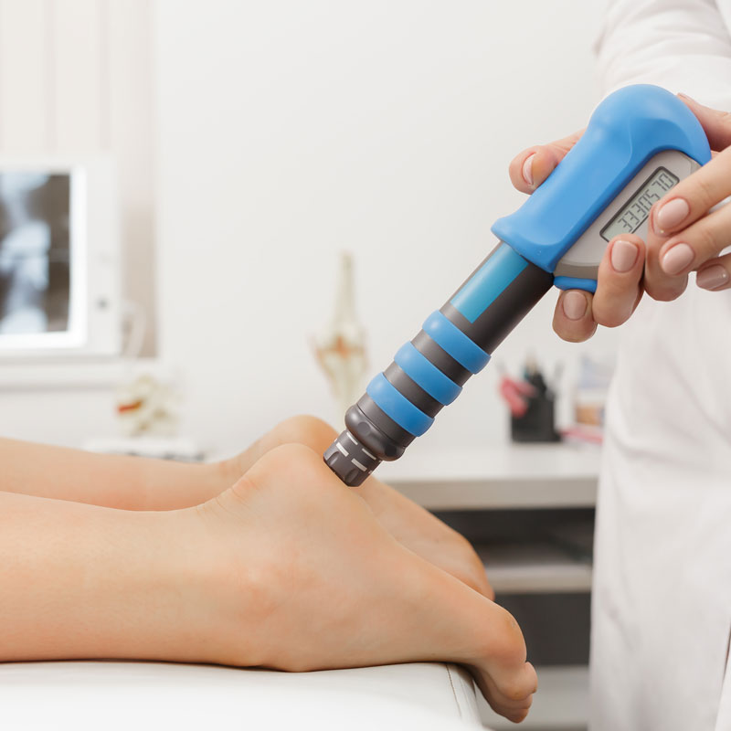 Shockwave therapy device being applied